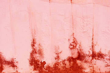 Texture of scratched painted red wall