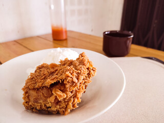 Fried Crispy Chicken with Steamed White Rice on Plate