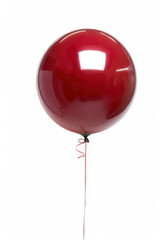 A shiny red balloon on a string, often used for celebrations and parties.