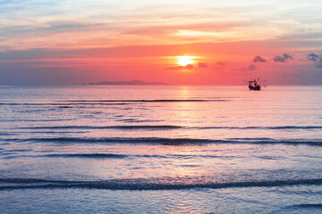 Sea sunset landscape, beautiful ocean sunrise, tropical island beach, fisherman boat, ship silhouette, blue waves, colorful pink red orange sky, water sun reflection, summer holidays, vacation, travel