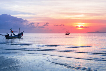 Sea sunset landscape, beautiful ocean sunrise, tropical island beach, fisherman boat, ship silhouette, blue waves, colorful pink red orange sky, water sun reflection, summer holidays, vacation, travel