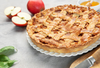 Delicious homemade apple pie with honey and coffee enjoyed during autumn season