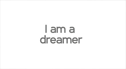 Inspirational phrase "I am a dreamer" in simple grey text on a clean white background, conveying aspiration and hope.