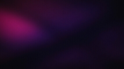 Abstract dark purple background with a soft light creating a mysterious and elegant blurred texture