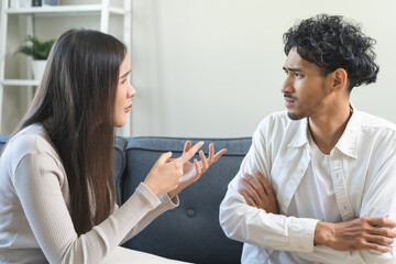 Breakup and depressed, asian young quarrel couple love fight relationship in trouble. Different people are emotion angry. Argue wife has expression upset with husband. Problem of family people.