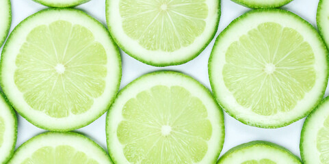 lime slices background slices of lemon or lime aranged on a table 