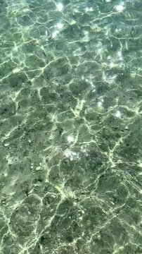 Top view of sea little waves pattern and crystal clear water. Armenia, Sevan. High quality