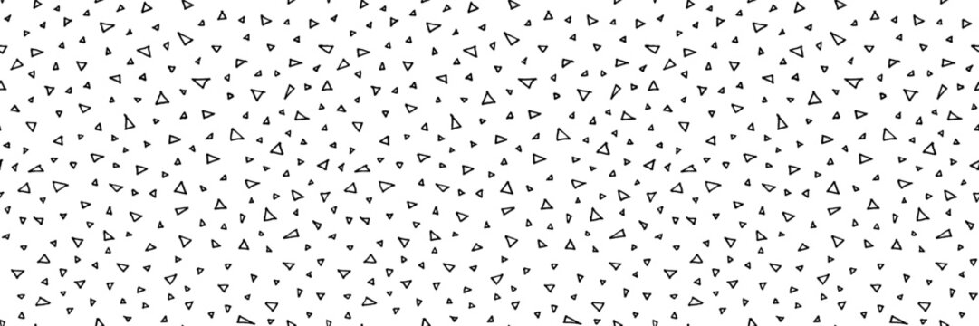 Vector hand drawn seamless pattern with tiny small triangles. Artistic digital paper. Endless texture backdrop. Tileable background illustration in black and white colors