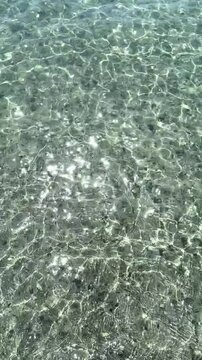 Top view of sea little waves pattern and crystal clear water. Armenia, Sevan. High quality