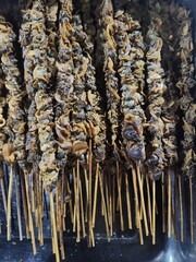 Indonesian Mussel Satay is a savory Indonesian delicacy made from tender, spiced mussels skewered and grilled or stir-fried, bursting with rich, aromatic flavors of garlic, chili, and traditional herb