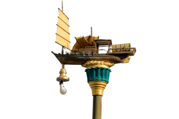 An old, vintage street lamp with a glass bulb on a metal post is isolated on white, much like a crane hook