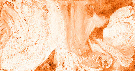 Abstract marble background of different shades of orange on white colors. Chaotic spots, dots, splashes and lines. Uneven spots. In some places they are more saturated and darker. Peach, ocher shades.