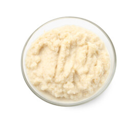 Tasty horseradish sauce in bowl isolated on white, top view