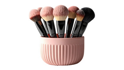 Makeup brushes in a pink organizer