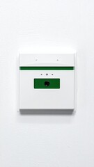White wall-mounted device with a green strip and camera