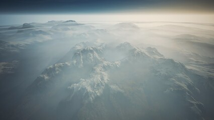 Layers of mountains rise majestically from a sea of mist in the early morning light, creating a tranquil and ethereal landscape that captivates the spirit and ignites the imagination.