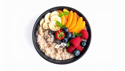 A vibrant breakfast bowl featuring oatmeal topped with fresh fruits and chia seeds, perfect for a healthy start to the day.