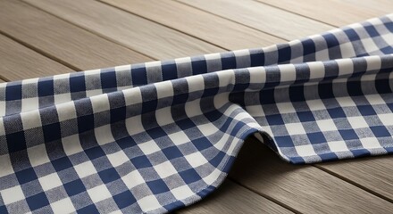 Checkered Tablecloth on Wooden Surface.