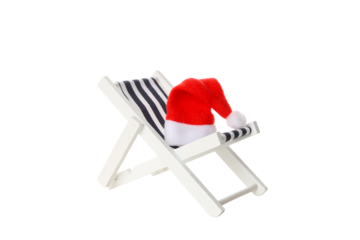 Beach chair with Santa hat for holiday vibes, on white, PNG