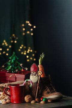 Saint Nicholas Day background with gifts and shoe
