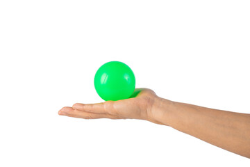 Green plastic ball in hand, transparent background