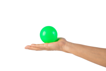 Green plastic ball in hand, transparent background
