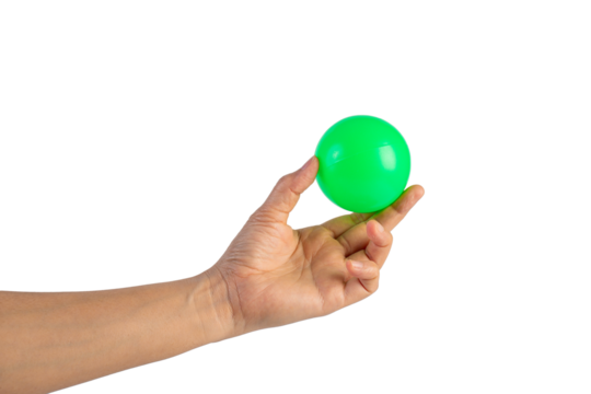 Green plastic ball in hand, transparent background