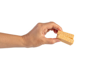Wafer biscuit with chocolate cream and hand isolated on transparent background