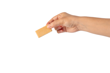 Wafer biscuit with chocolate cream and hand isolated on transparent background