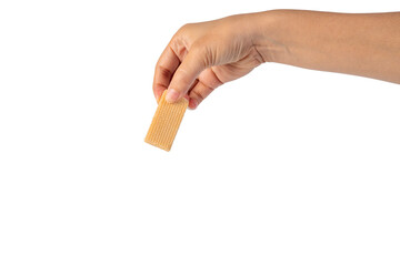 Wafer biscuit with chocolate cream and hand isolated on transparent background