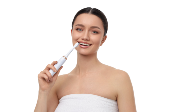 Smiling woman with electric toothbrush, isolated, PNG