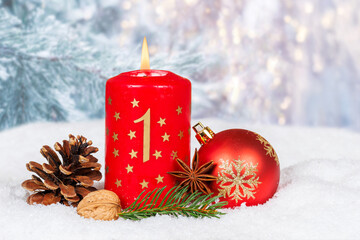 First 1st Sunday in advent Christmas time copyspace copy space with burning candle snow winter