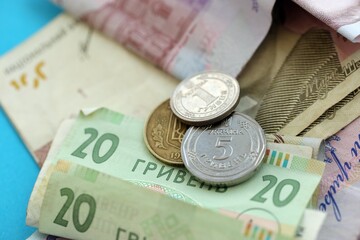 Big amount of different Ukrainian hryvnia money bills. Pile of crumpled ukrainian banknotes