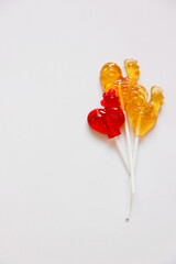 Red and yellow candy. Lollipops on white background