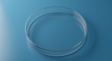Minimalist laboratory mockup: Clear petri dish on blue surface for product showcase