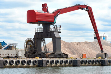 Harbor Crane Loading Gravel, Waterside Industrial Scene