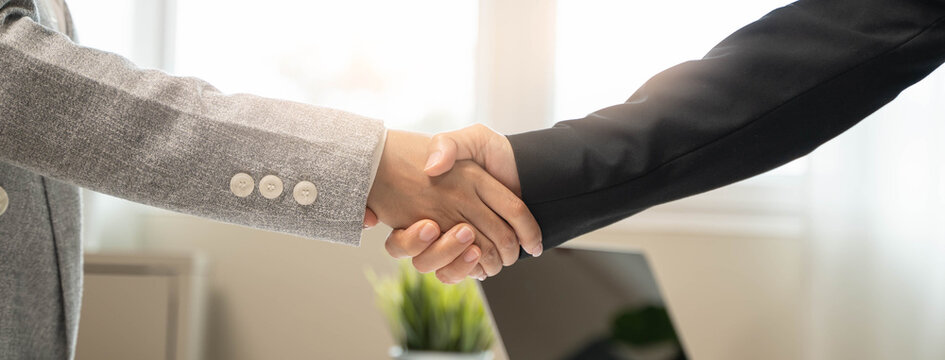 Deal agreement confirm, Two business people shaking hands to be partner in business and support together.