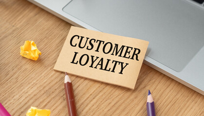 A sign that says Customer Loyalty is on a table