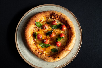 Margherita Pizza: A culinary masterpiece, a freshly baked margherita pizza adorned with vibrant red tomatoes and fresh basil leaves, resting invitingly on a rustic plate.