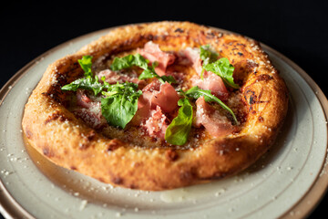 Artisan Pizza: A beautifully crafted, close-up view of an artisan pizza, featuring fresh ingredients atop a perfectly baked crust, evoking warmth and deliciousness.