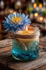 Blue candle jar with flower