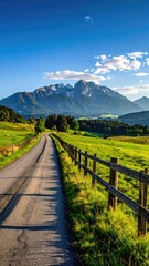 Scenic mountain road with wooden fence