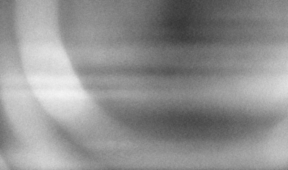Stippled grain texture background. Black sprayed dots gradient wallpaper. Rough noisy sand dotted backdrop.