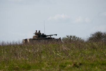 British army Warrior FV510 IFV tank in action on a battle exercise
