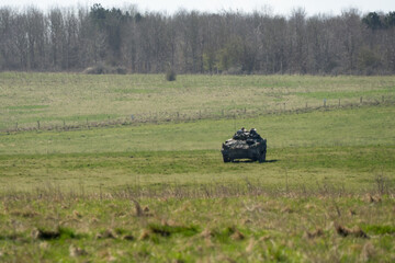 British army Warrior FV510 IFV tank in action on a battle exercise