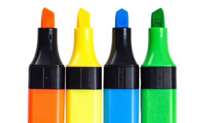 Set of four colorful highlighter pens in various hues isolated on a transparent background, PNG. High resolution.