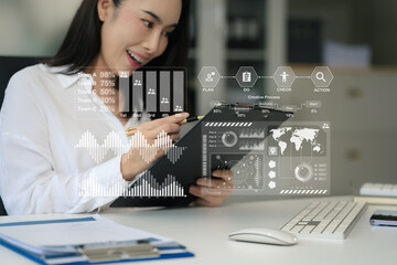 businesswoman analyzing stats and graphs on paperwork outside a modern office building. Ideal for themes of success, analysis, and corporate growth.