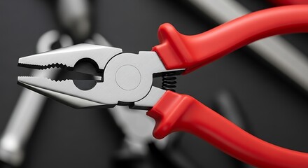 Close-up of Red-Handled Pliers on Dark Background.