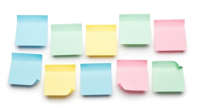 Colorful blank sticky notes in blue, green, yellow, and pink on a white background, perfect for reminders, ideas, or organization.