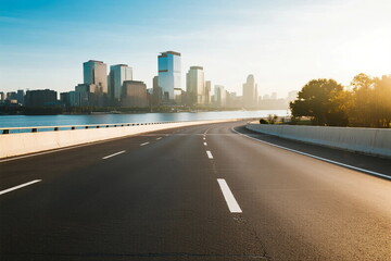 Fototapeta premium Smooth road leading to a modern city skyline under clear sky